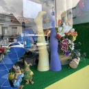 Shop window decorated with floral elements and Easter motifs....