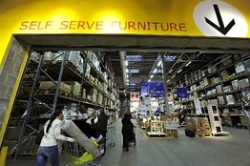 Shoppers push carts into an Ikea in West London.