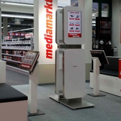 Media Markt in Bern relies on screens of various sizes and terminal stands that...