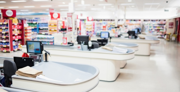 Photo: Cash registers and shelves in a supermarket; copyright: panthermedia /...