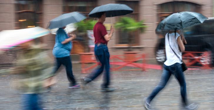 People walking in the rain.