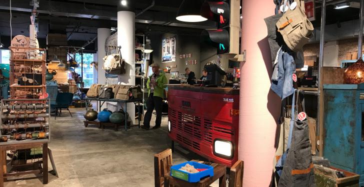 Cash desk in a store made out of the front of a red truck...