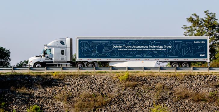 Huge truck on a street; copyright: Daimler AG