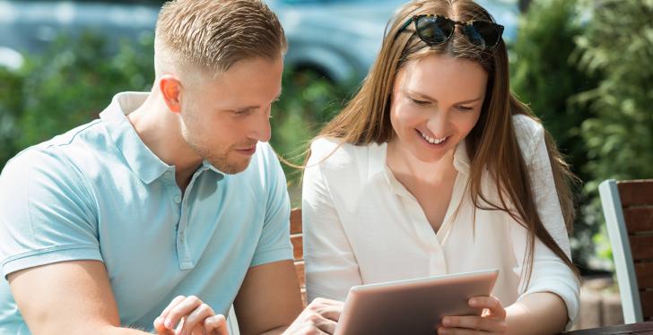 Couple using a tablet
