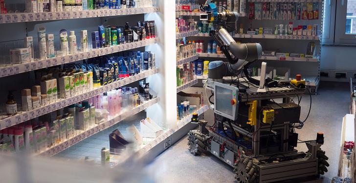A robot between shelves at a drugstore