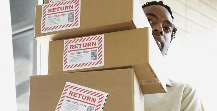 Man carrying a lot of packages