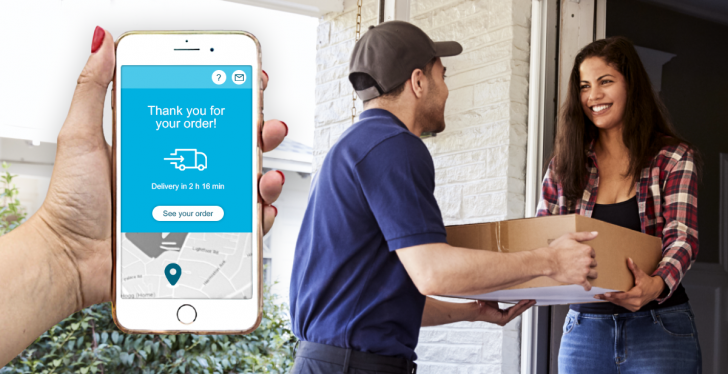 A woman receives a package from a courier.