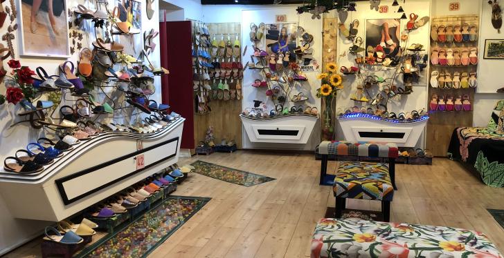 A colourfully decorated shoe shop