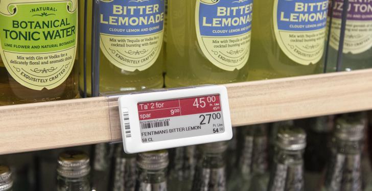 Close up of a shelf in a grocery store with an electronic shelf label...