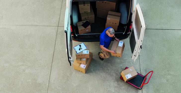 A man unloading a van, getting a birds-eye view
