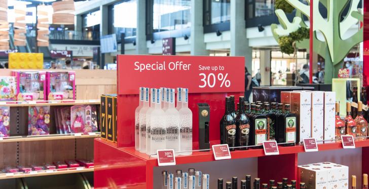 Duty free shop with drinks and digital signage