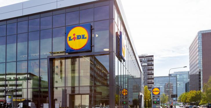 Exterior view of a Lidl store with a glass facade