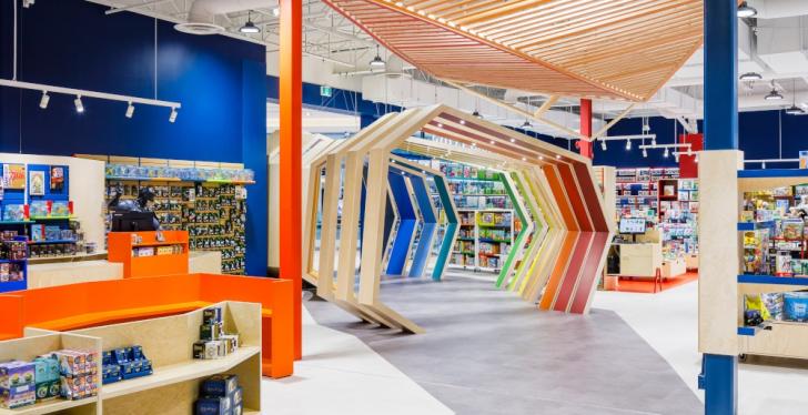 A game store with colorful shop design and rainbow-colored wooden arches as an...