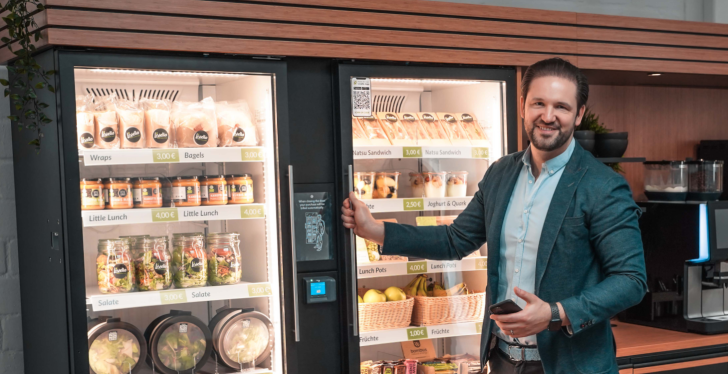 Alexander Eissing, Managing Director of Livello GmbH, at a vending machine...
