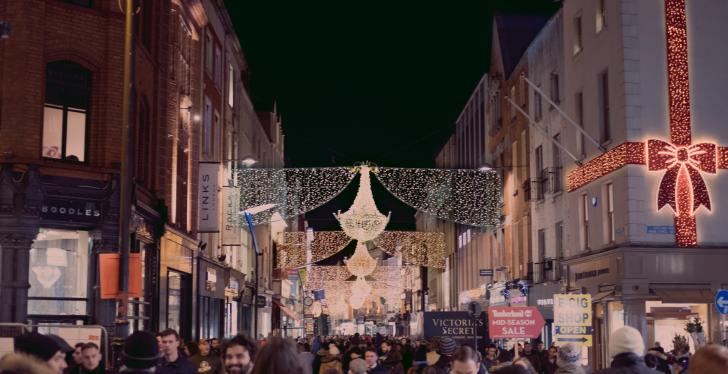 A crowded shopping street at Christmas time