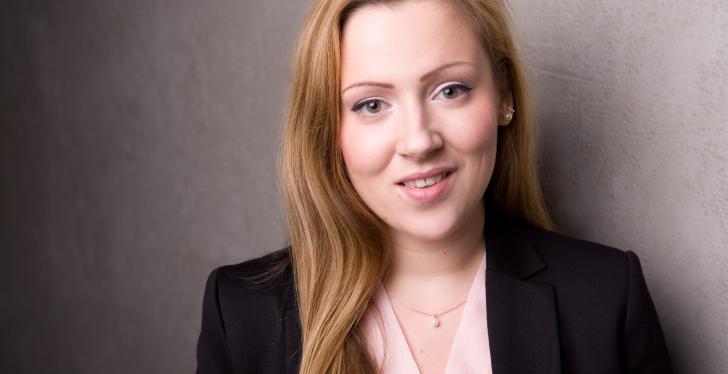 Smiling woman with long blond hair