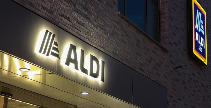 Exterior view of an Aldi Süd branch with illuminated Aldi sign...