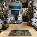 View into a colourfully decorated shoe shop