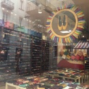 A view through the shop window into a shoe store