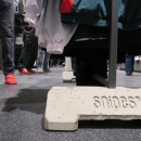A concrete base for a coat stand with the Snipes logo embedded...