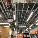 Ceiling in an Amazon Go store with lighting elements and surveillance cameras...