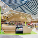 A game store with colorful shop design and wooden cash desk in the middle...