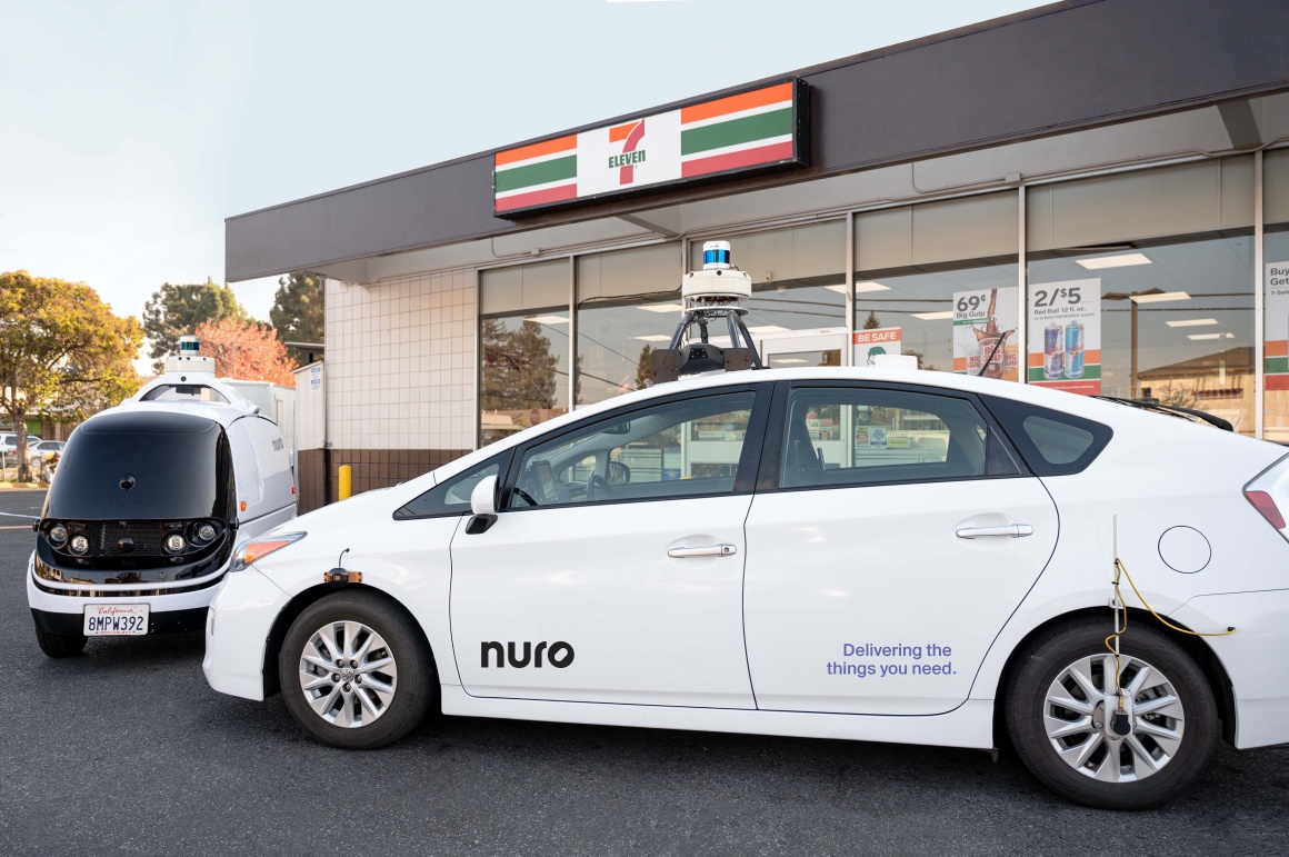 Two delivery vehicles standing in front of a 7-Eleven store; copyright: 7-Eleven...