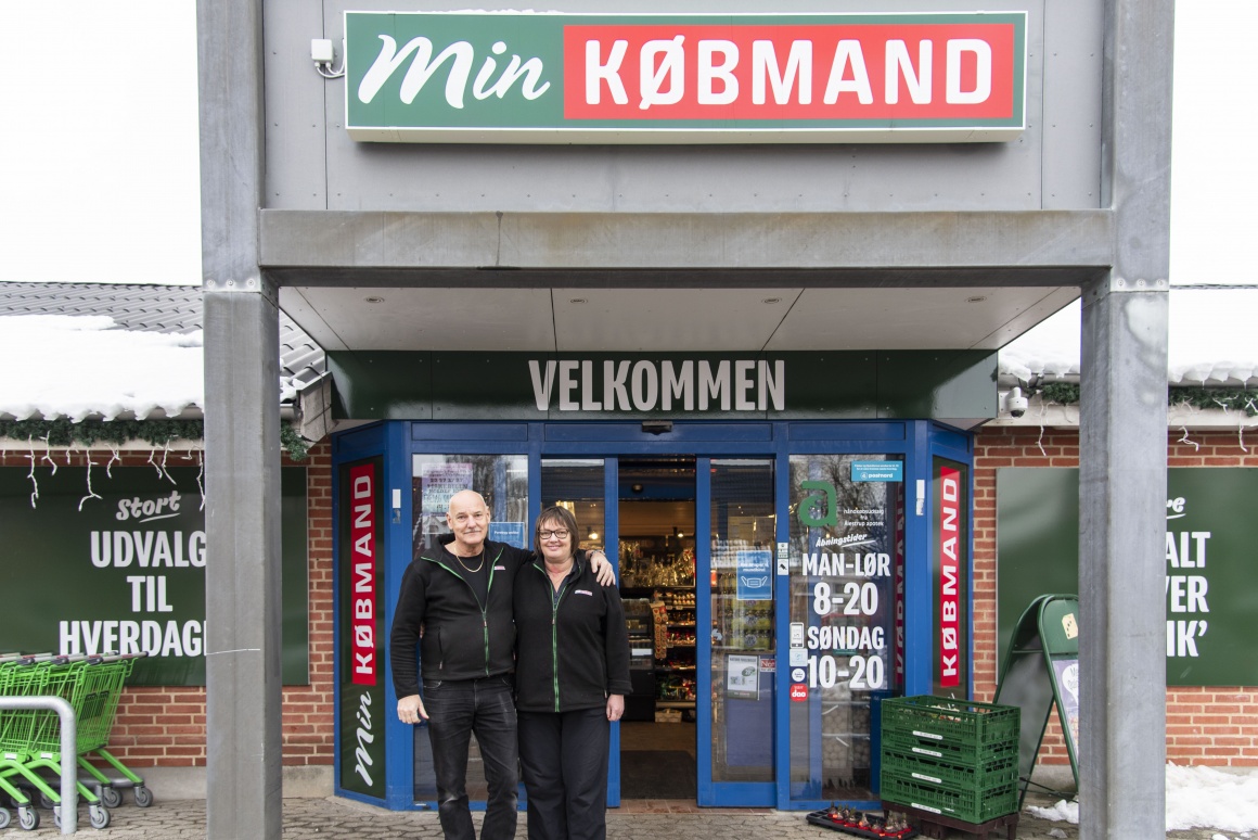 Pia Ambrosius and Hans-Peter Ambrosius outside their store...