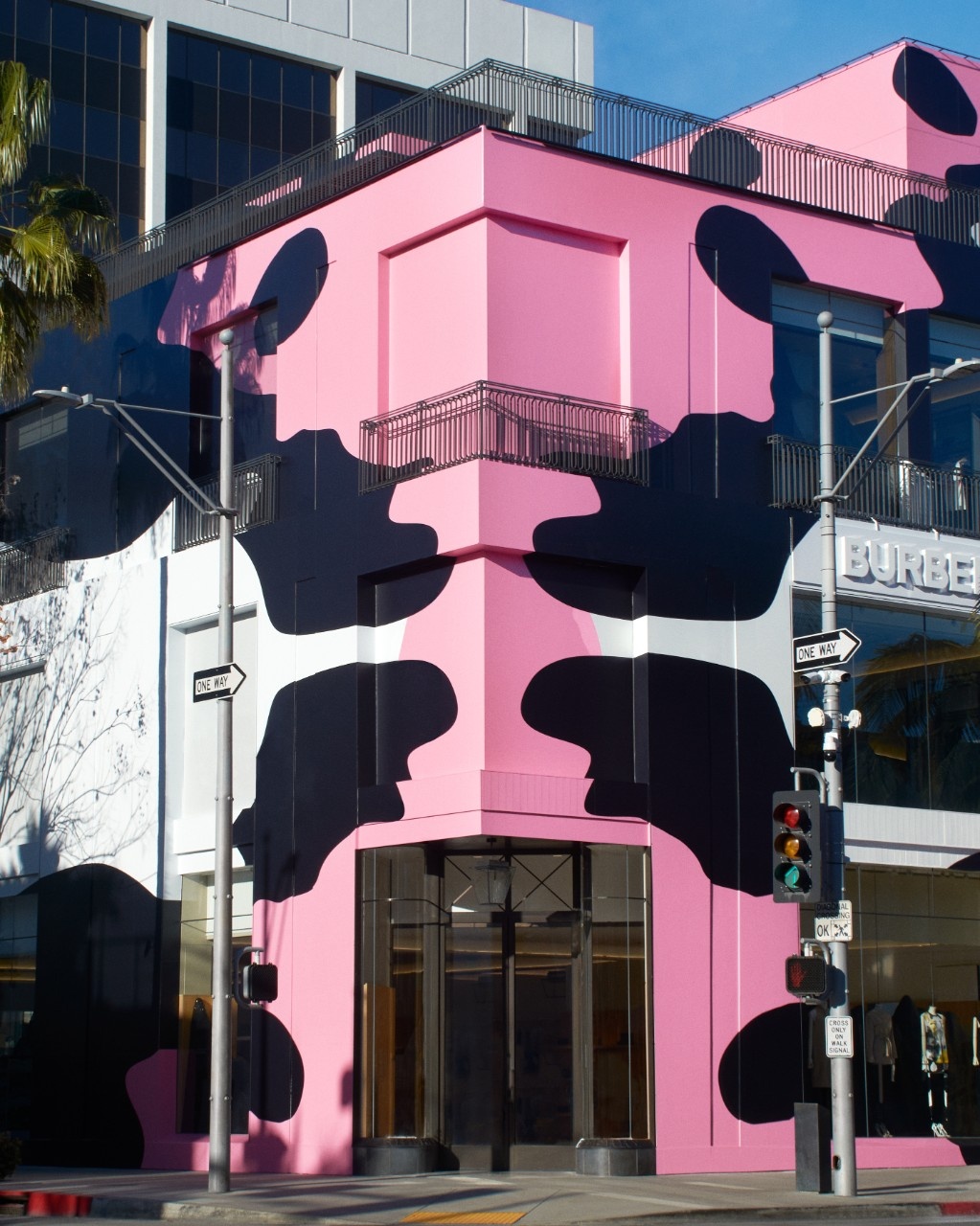 A Burberry Store building facade in camouflage print with black, white and...