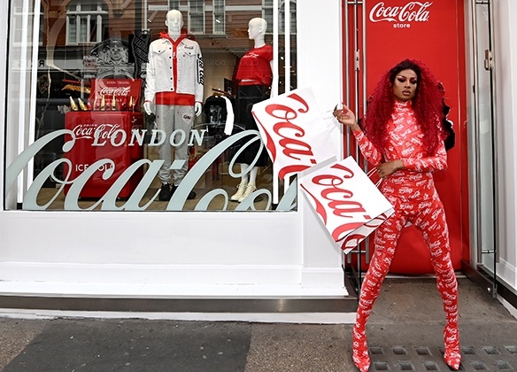 Drag queen Tayce Szura-Radix in front of the new Coca-Cola store in London...
