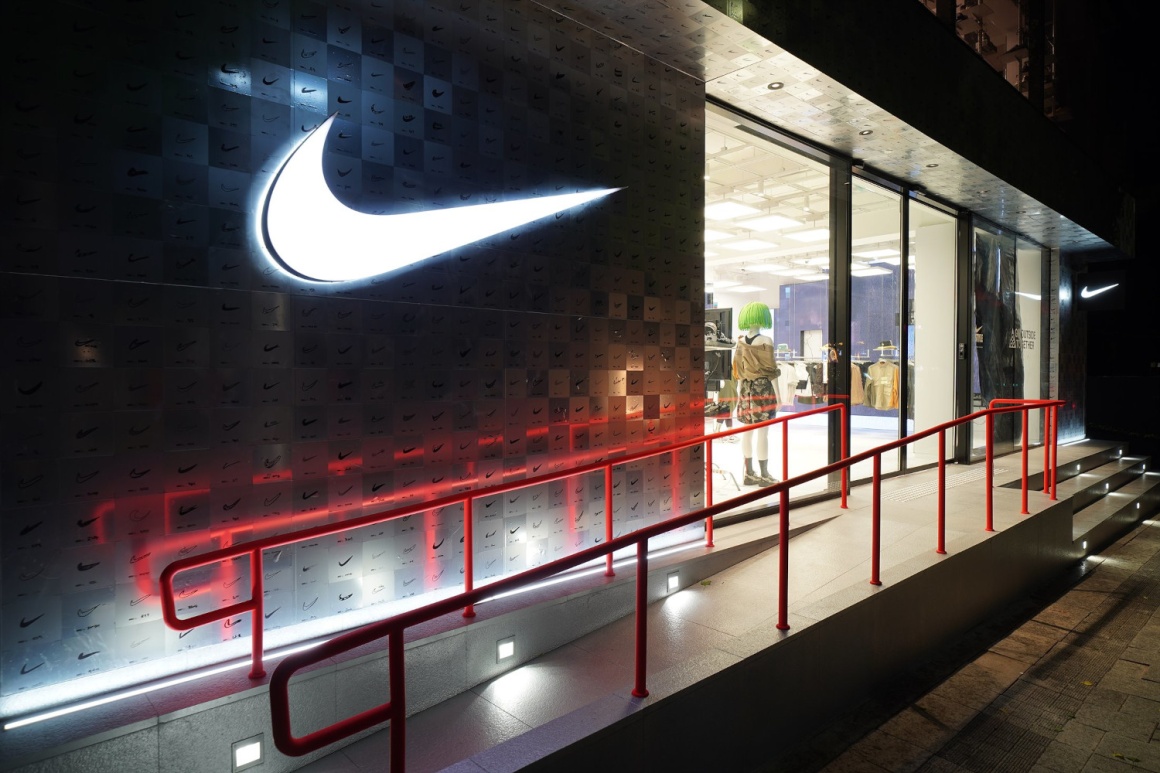 Outside view of the Nike Style store in Seoul with the illuminated Nike logo on...