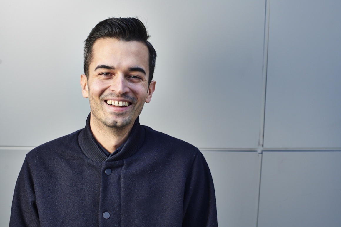 Fabio Adlassnigg, Head of Communications Wolt, smiles at the camera...