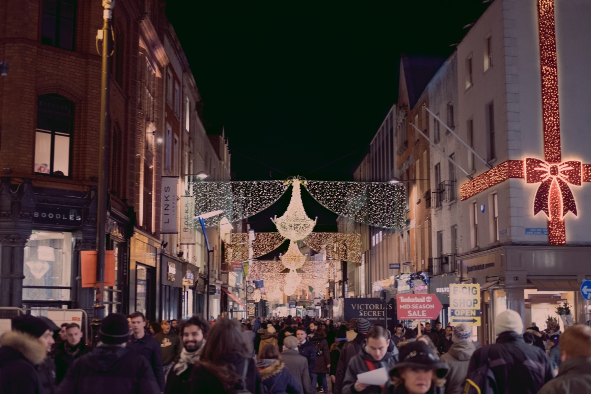 A crowded shopping street at Christmas time