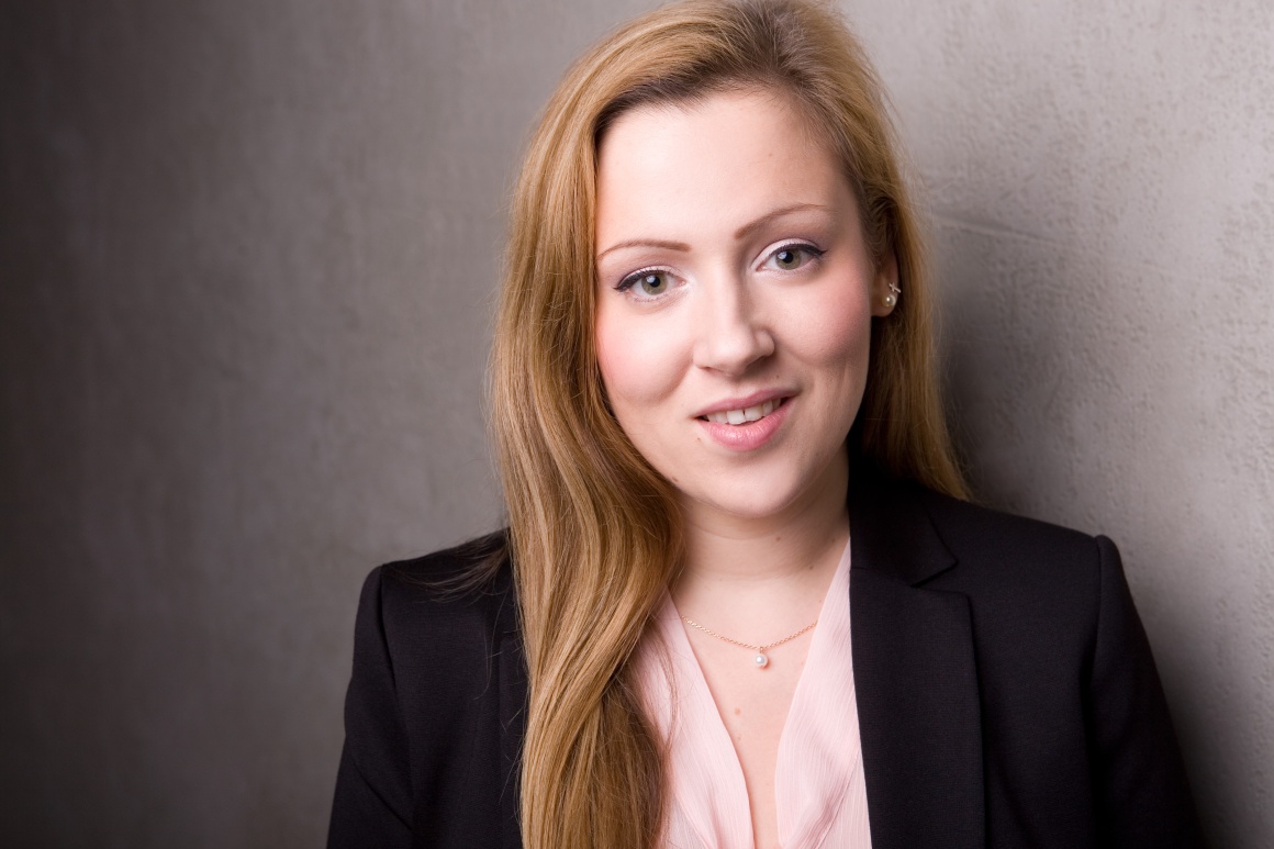 Smiling woman with long blond hair