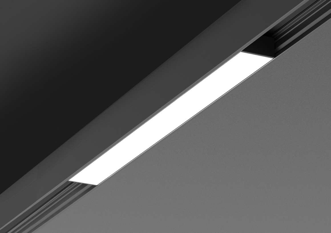 A white ceiling light in a black holder