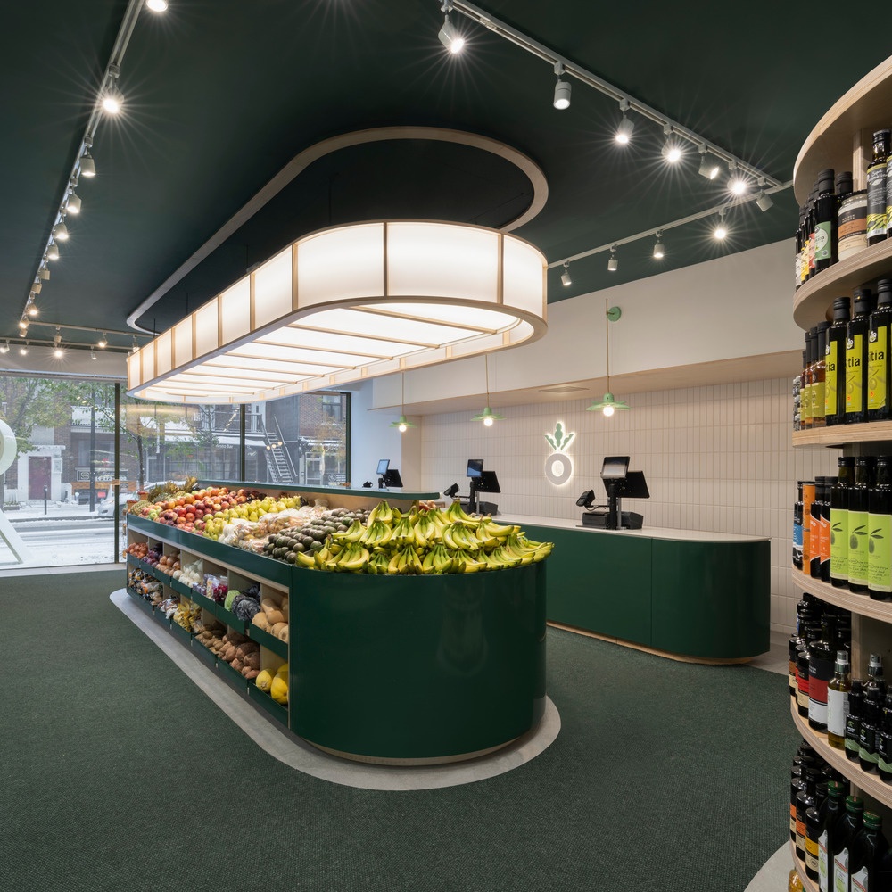 Fruit counter and checkout at Fraîchement Bon Jarry...