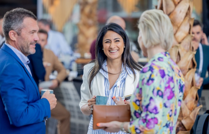 People talking at an event