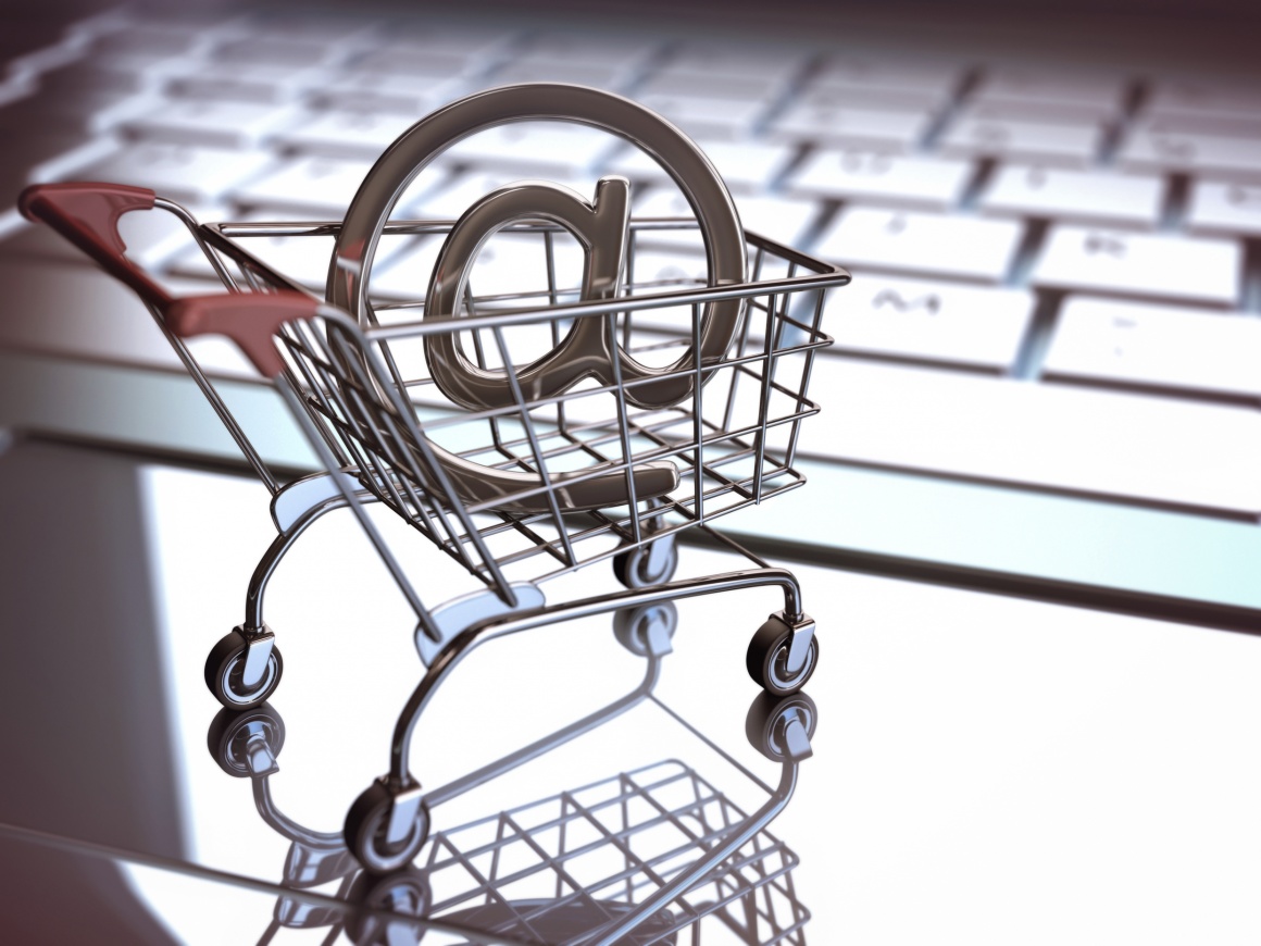 Photo: Small shopping cart carrying at symbol; copyright: panthermedia /...