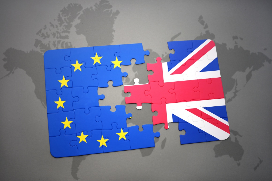 Photo: Flags of UK and EU as separate puzzle pieces; copyright:...