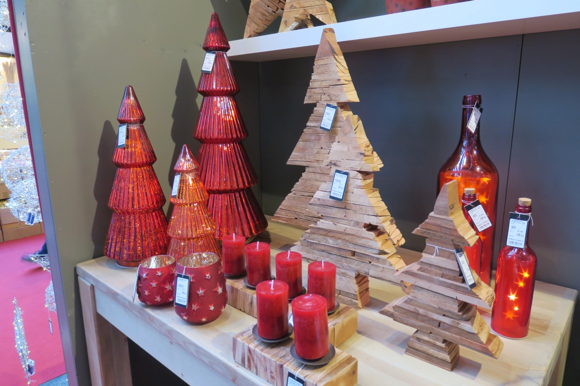 Christmas decorations made of glass and wood in the form of fir trees;...