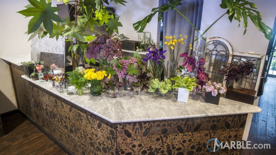 flower arrangements on a countertop of a flower shop...