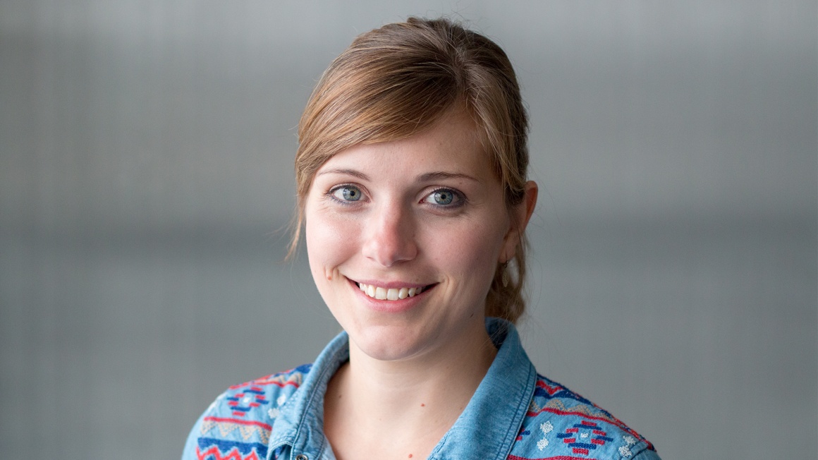 Woman smiles into the camera