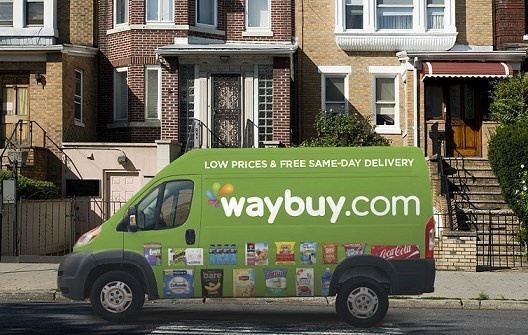 Green delivery van in front of a row of houses; copyright: Waybuy...