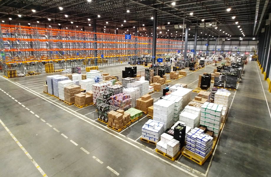 Huge warehouse with pallets and crates; copyright: Walmart...