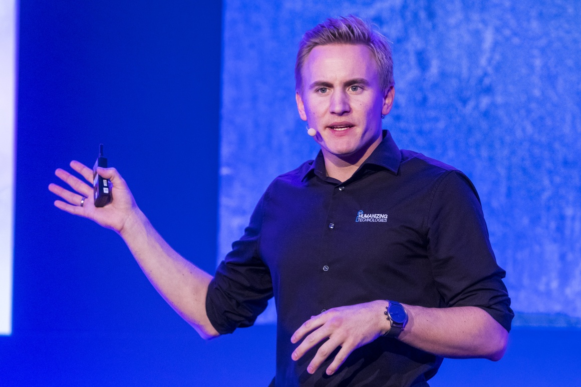 Picture of a young man giving a lecture; copyright: Humanizing Technologies GmbH...