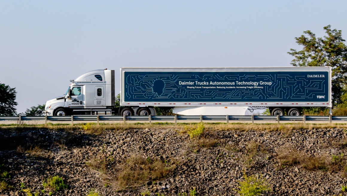 Huge truck on a street; copyright: Daimler AG