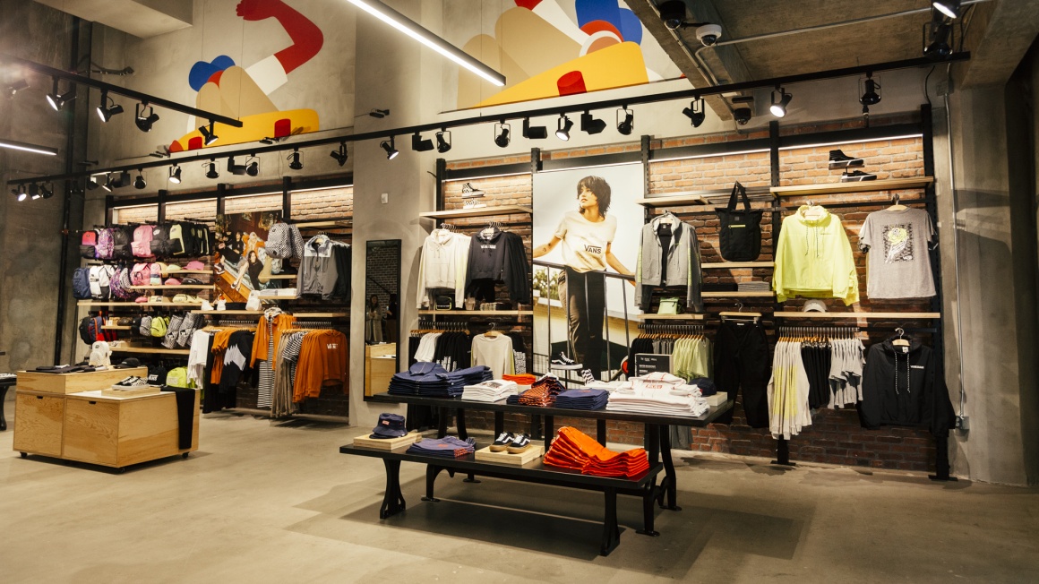 Inside of a modern fashion store with women’s clothing; copyright: Vans...