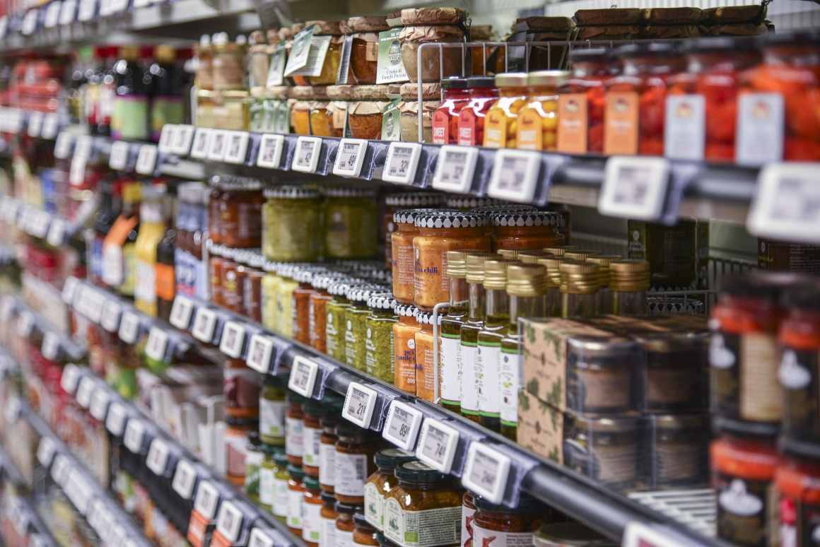 shelf in food retail with products and electronic shelf labels...