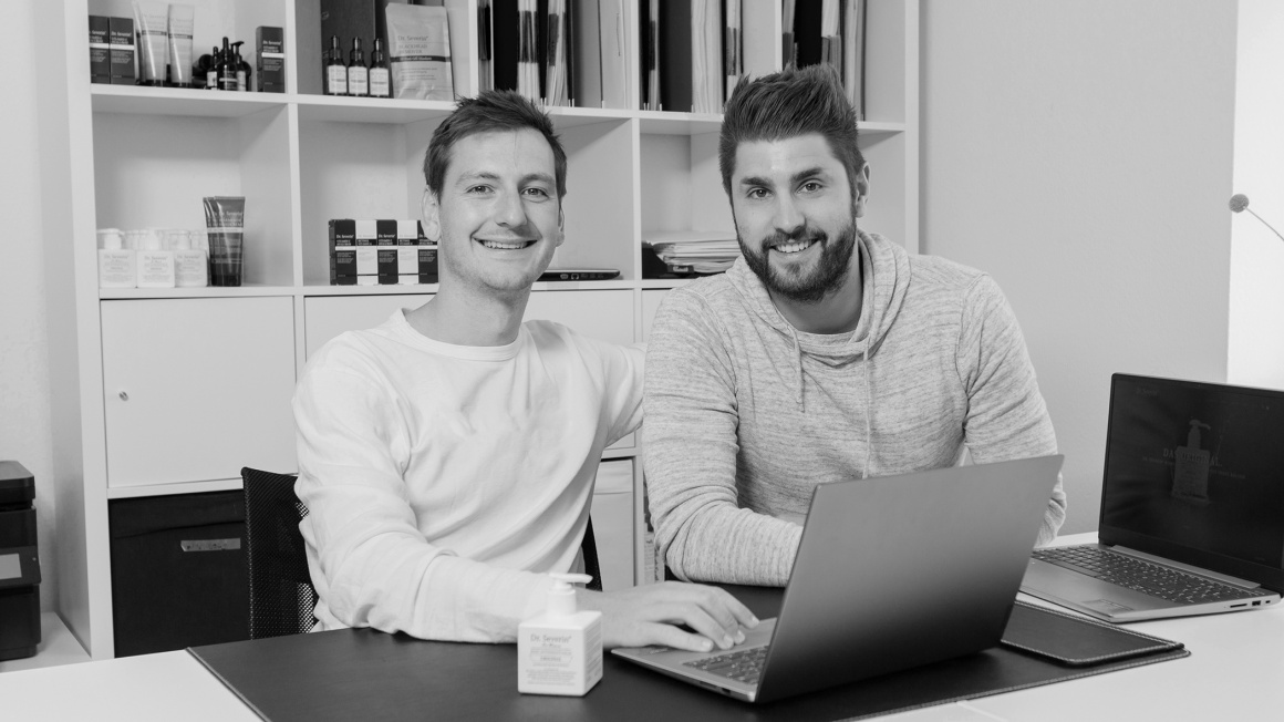 Black and white photo of two men