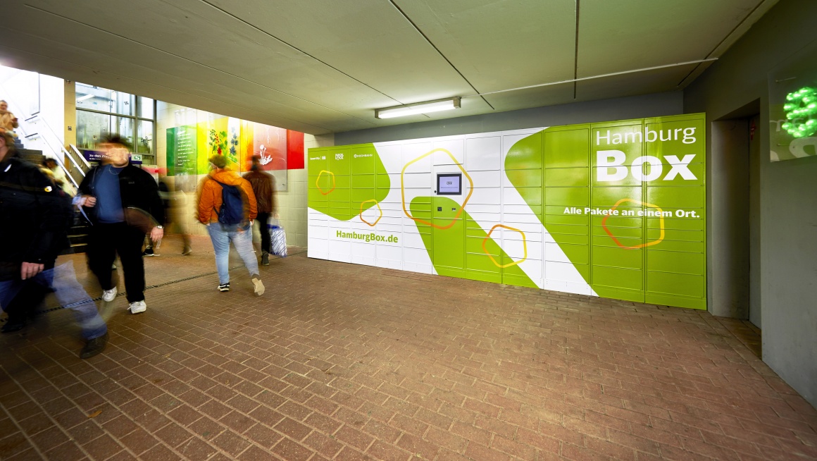 Green and white pickup station in a subway station